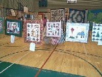 #497. 1 st clothes line - (winter welcome, birdhouses, trees, girl waters flowers)