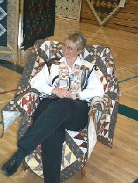 #584. Main Quilt Show - Fernie Quilt Guild member shows off one use for quilts